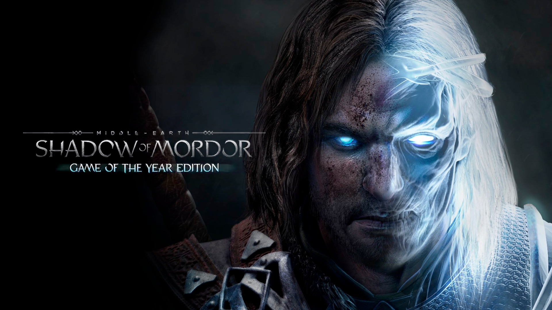 Immagine promozionale di "Middle-Earth: Shadow of Mordor - Game of the Year Edition" con il protagonista, metà umano e metà spirito, con occhi luminosi e sfondo scuro.