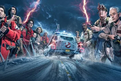 Il team di Ghostbusters, vecchi e nuovi membri, si prepara a combattere entità paranormali con fulmini di protoni mentre la Ecto-1 sfreccia su una strada innevata.
