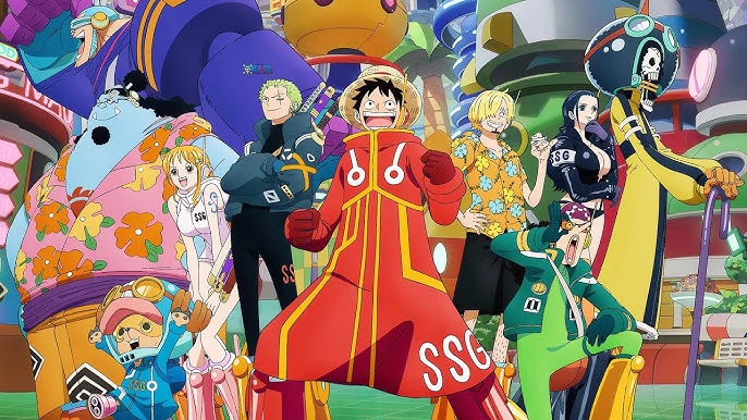 Il gruppo dei Pirati di Cappello di Paglia in abiti futuristici nell'arco di Egghead in One Piece, con Luffy al centro in una veste rossa e gli altri membri in pose eroiche.