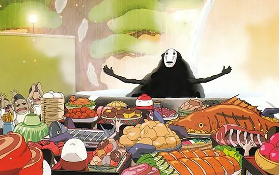 Libro Ricette Personaggio Senza Volto del film 'La città incantata' di Studio Ghibli seduto a un banchetto ricco di cibo, circondato da piatti esagerati e dettagliati