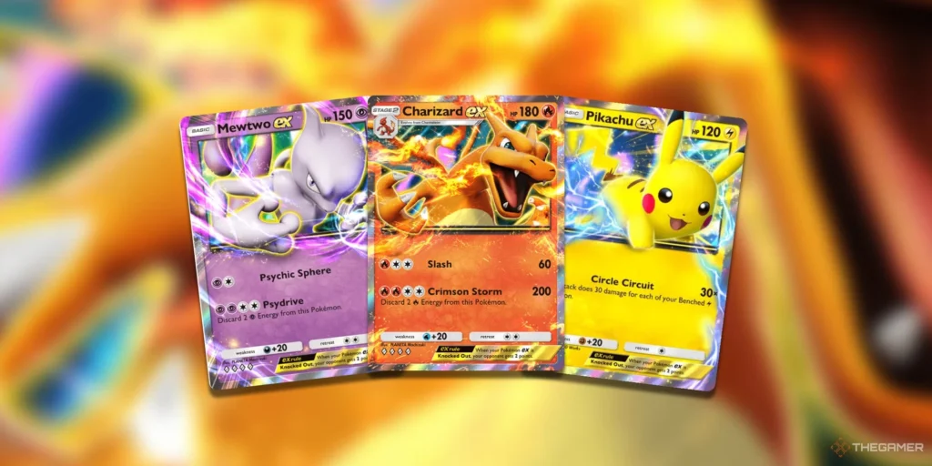 Carte Pokémon EX di Mewtwo, Charizard e Pikachu su sfondo sfocato.